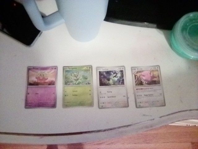 Four Pokemon Cards