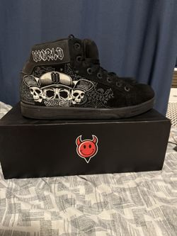 Black High-Top Sneakers with Skull Design
