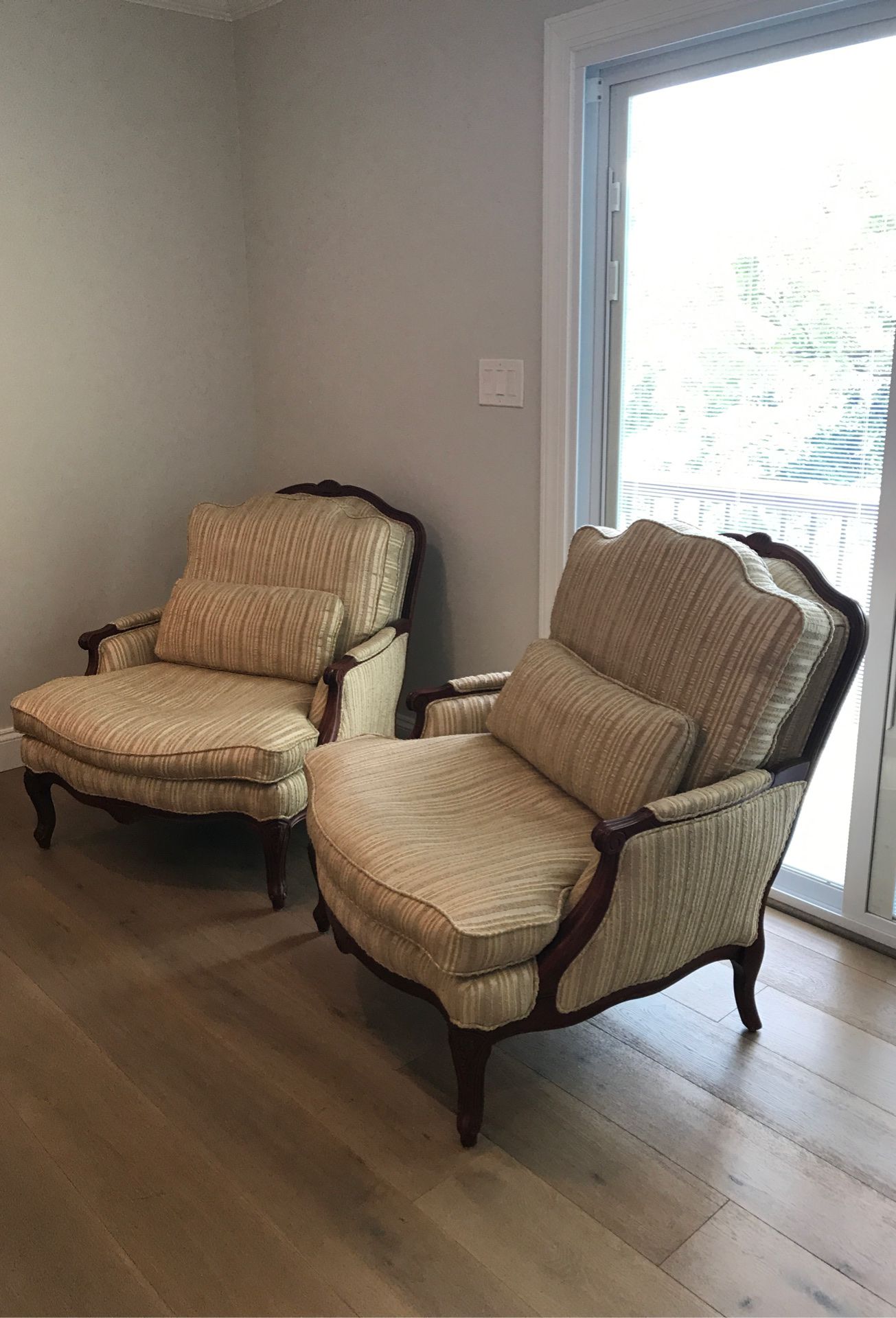 2 living room chairs by Norwalk Furniture Cherry/ Mahogany wood tone with cream colored fabric