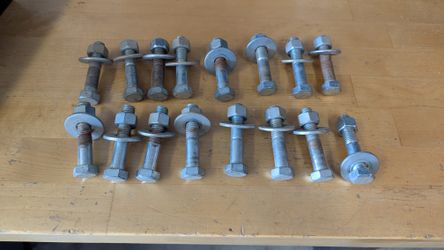 Sixteen 1/2" x 2.5" bolts with nuts and washers