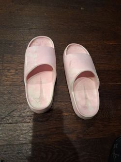 Pink Nike slides