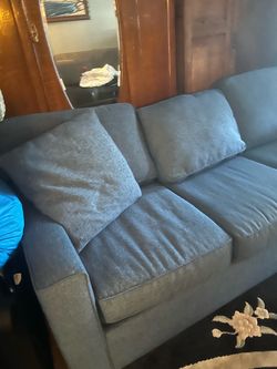 Blue feather linen couch
