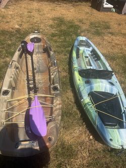 Two Sit-On-Top Kayaks with Paddles