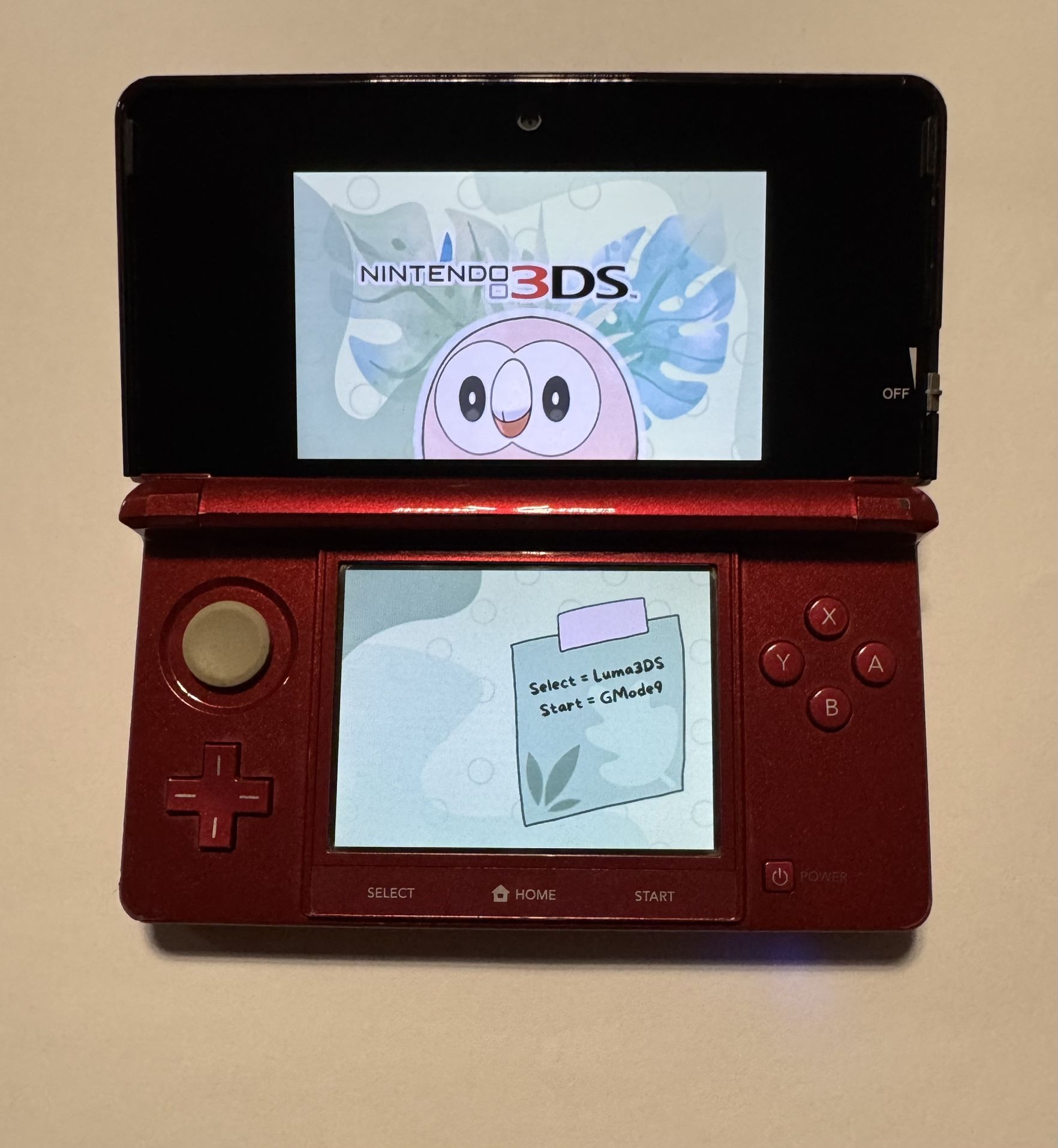 Flame red Nintendo 3ds with 690 games