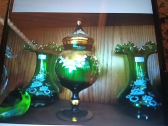 Antique.Candy dish and two  vases perfect, very old with gold trim.The set is one seventy five will not separate