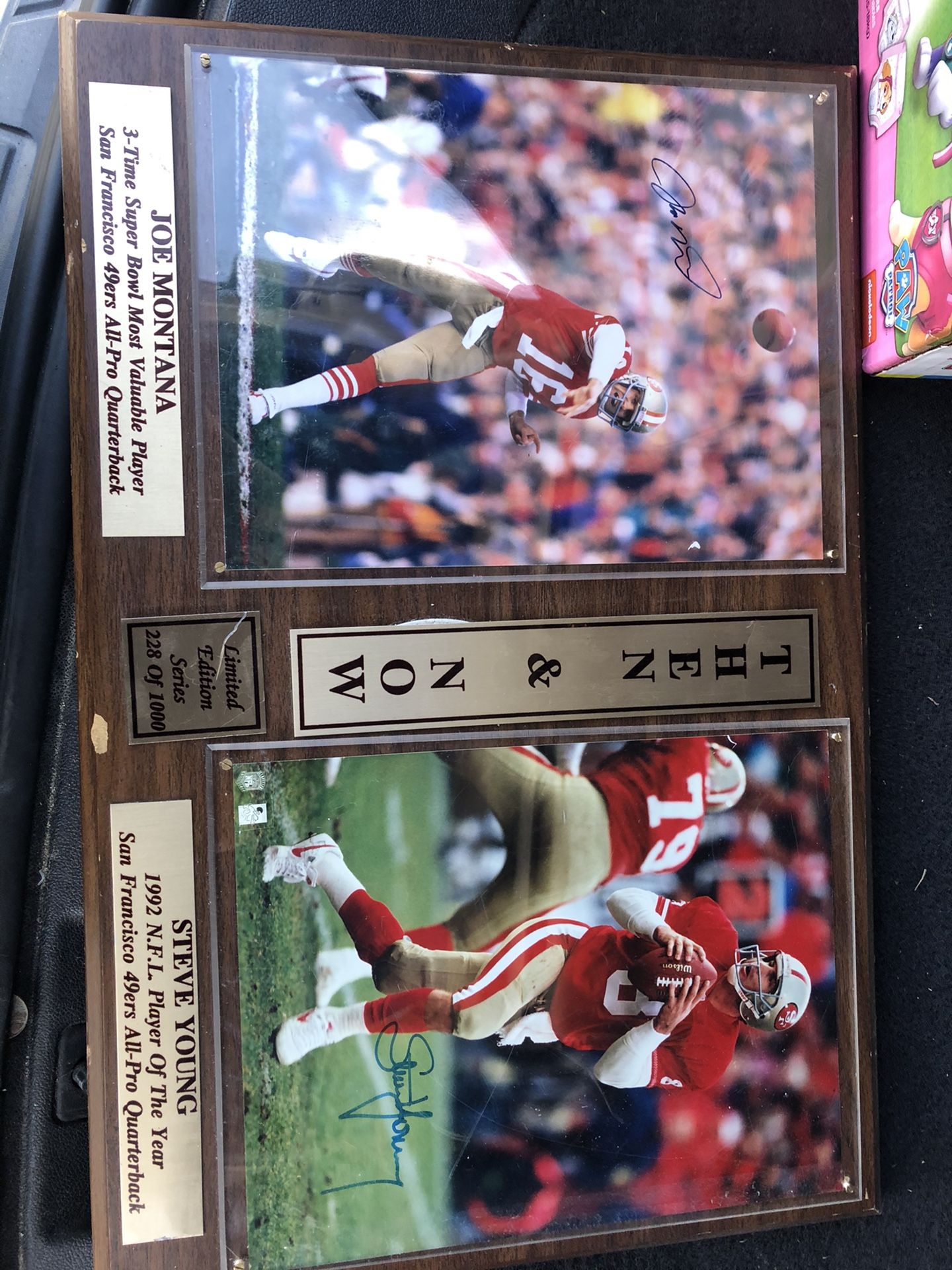 Signed Joe Montana and Steve Young plaque.