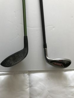 Two golf clubs.
