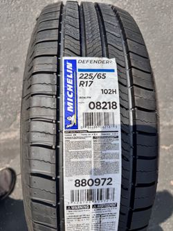 Single (1) 225 65 17 Michelin Defender tire
