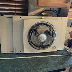 Galaxy vintage reversible intake exhaust fan adjustable slide out pieces to fit window.  No cracks or issues. Extends out to approximately 33” and 15”
