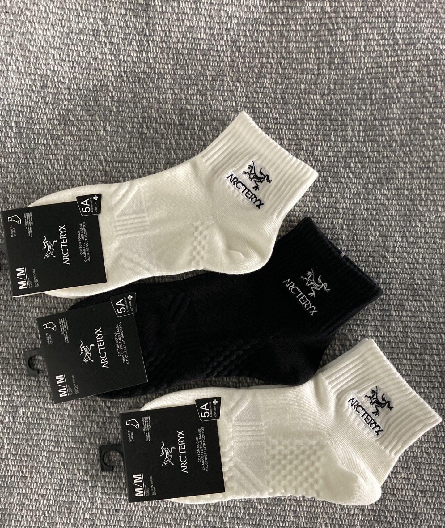 3 pairs of Arc'teryx socks are sold as a bundle