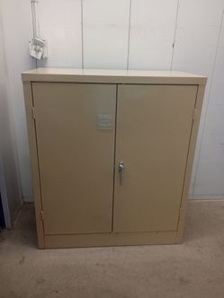 2 doors metal storage cabinet $ 150