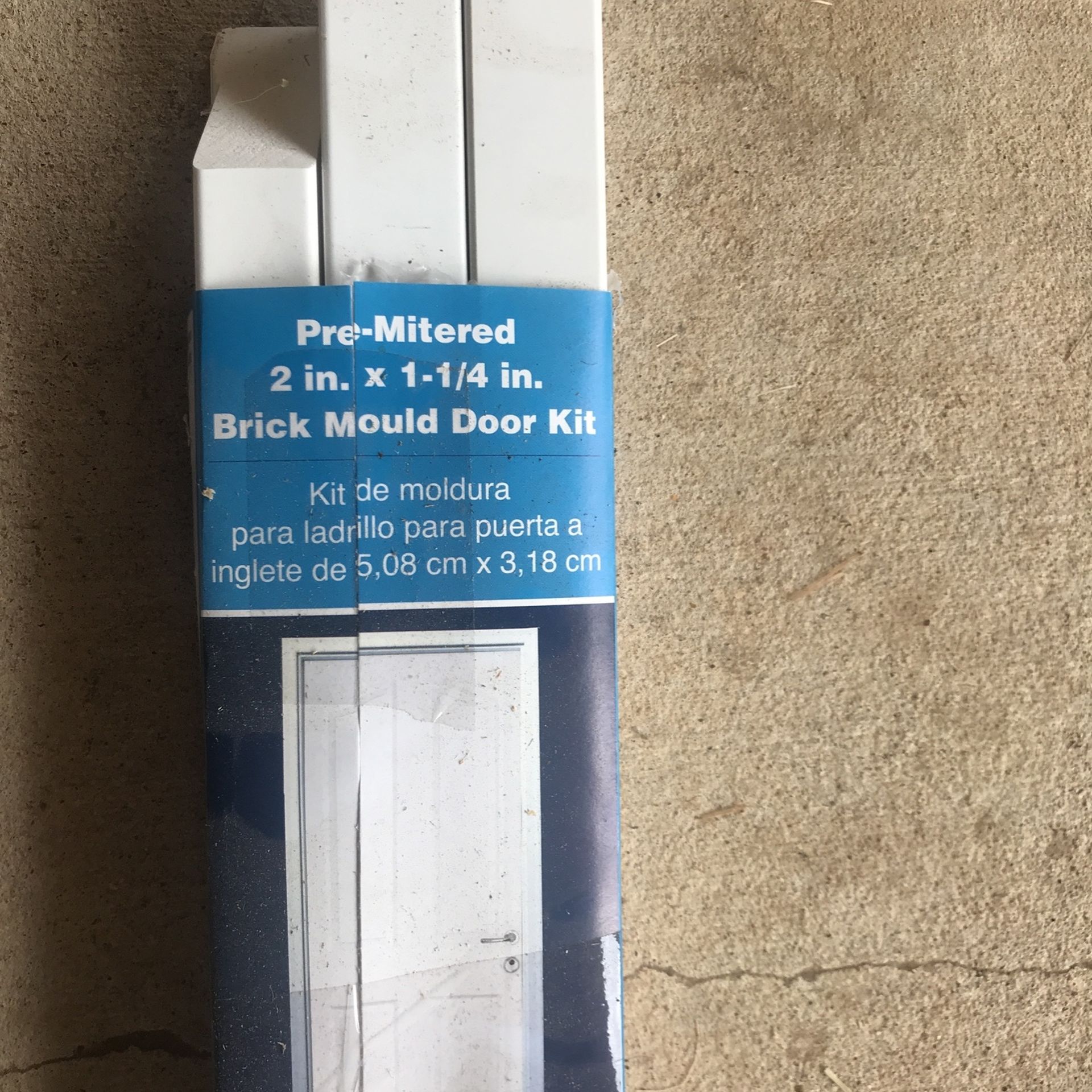 Pre-mitered brick mould door kit