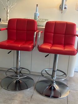 Pair of red bar stools