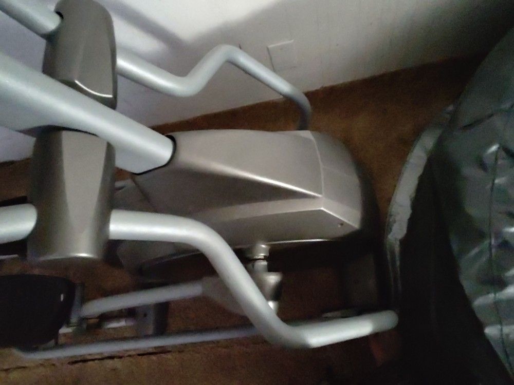 Leather Couch/ Elliptical