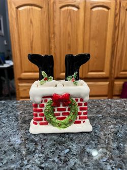 Ceramic Christmas Santa Boots in Chimney Pair of Salt and Pepper Shakers. Brand new never used. Has been on display in a cabinet with a very large s