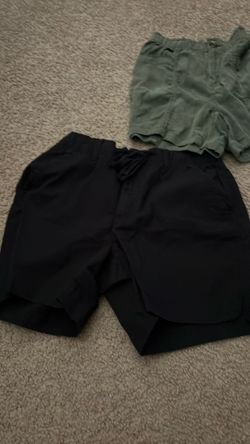 Pink, black and green shorts