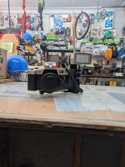 Film Camera with Mounted Flash