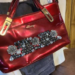Ruby Red Purse Still Has The plastic On The Handles 