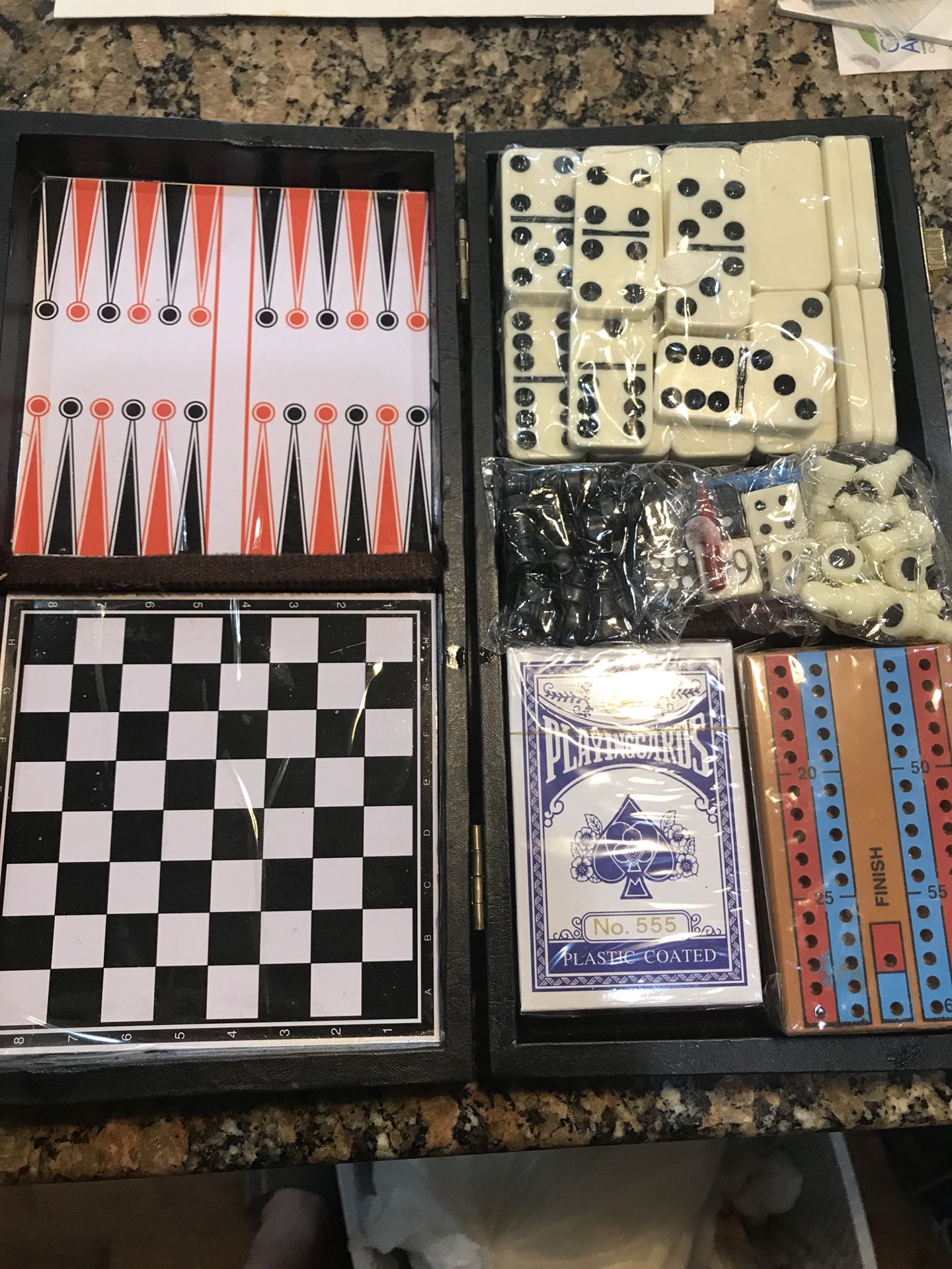 Compact checkers/chess/cribbage/backgammon/dominoes set