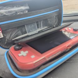 Nintendo Switch Lite (Coral) + 1TB SD Card + NBA 2K26 & Orzly Accessory Bundle