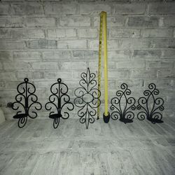Wall sconce candles and mini mirrors mainly wrought iron