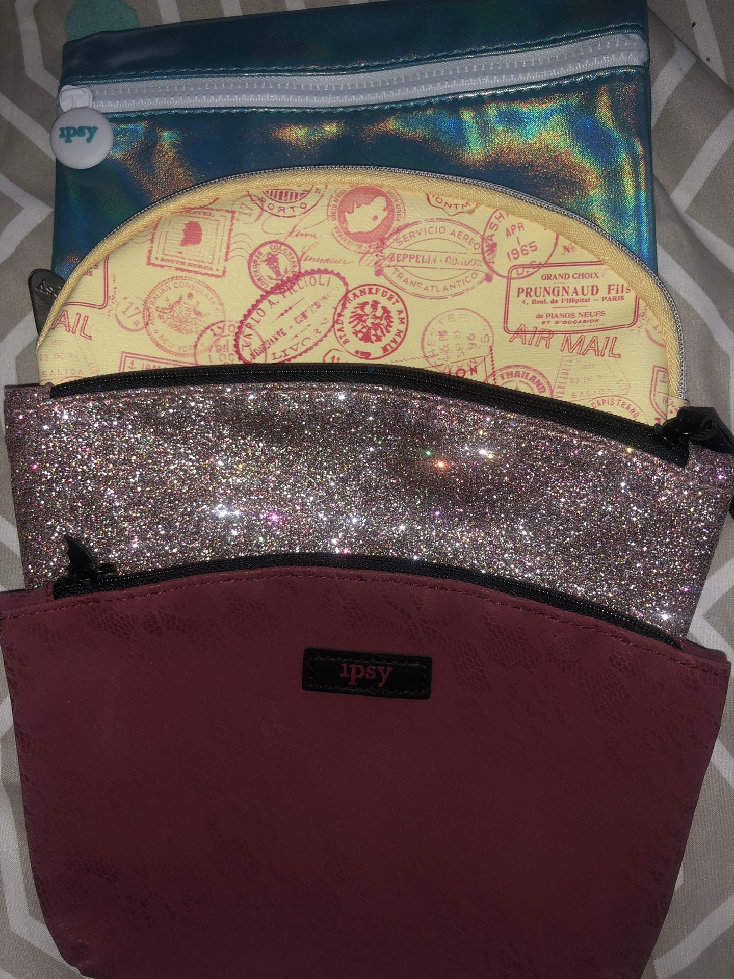 4 Ipsy makeup bags plus free face mask