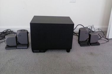 Altec Lansing THX surround sound system with subwoofer.