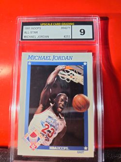 This image shows a 1991 Hoops All-Star Michael Jordan #253 basketball card graded 9 by Upscale Card Grading. Jordan HOF CHICAGO BULLS Grade: 9 (Mint