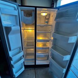 Black GE refrigerator with water dispenser for sale