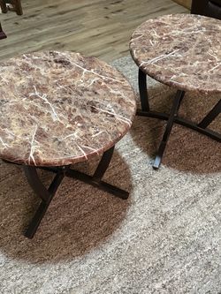 Two marble coffee tables