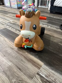 Fisher price pony walker