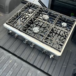 2 Stoves /2 Industrial Propane Grills/1 Vent Fan For Grill 2500$ Obo