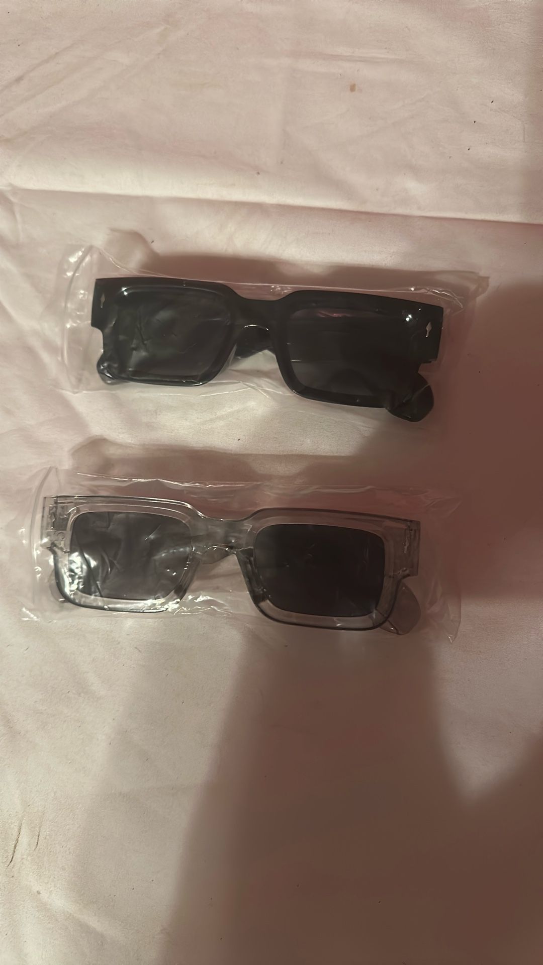 2 Pairs Of Glasses Black And White