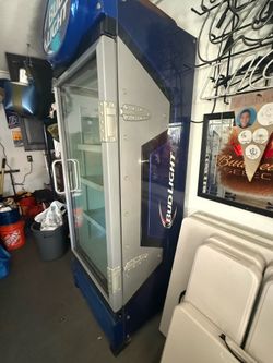 Bud light fridge 88t 30 w $900 need s work on it