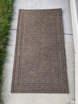 Brown Woven Area Rug with Border