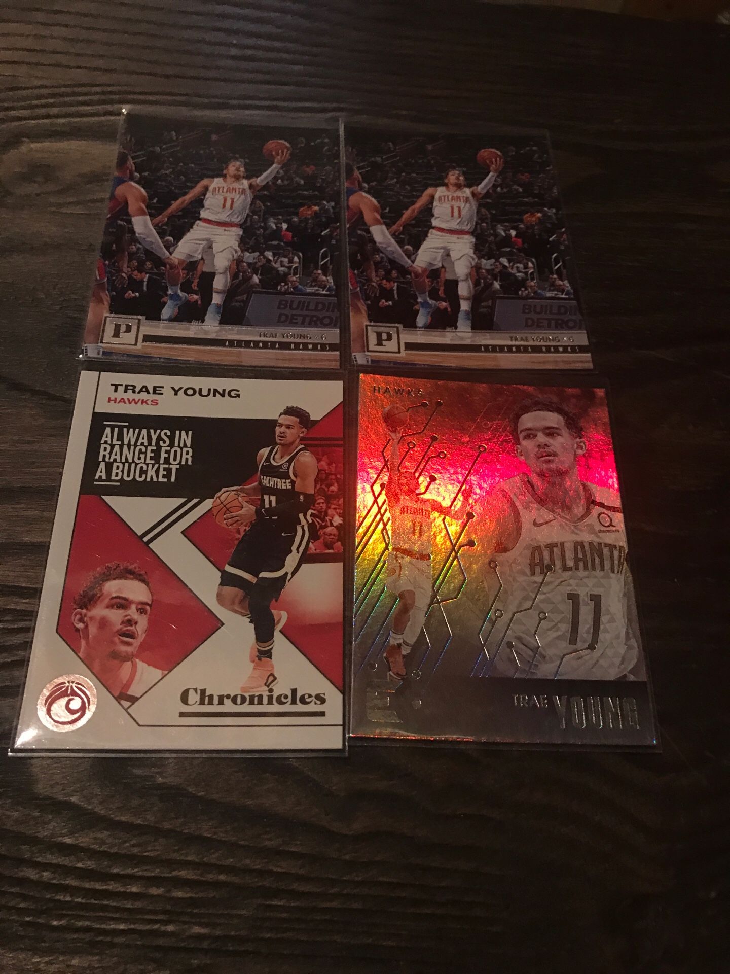 TRAE YOUNG LOT OF 4 CARDS