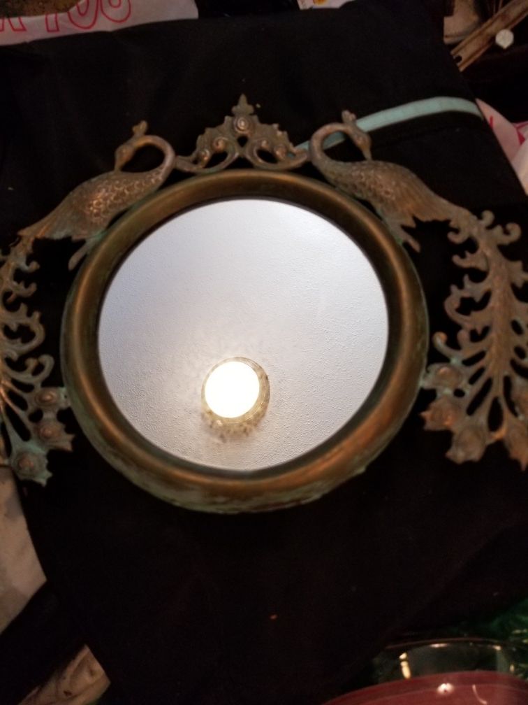 Brass antique mirror