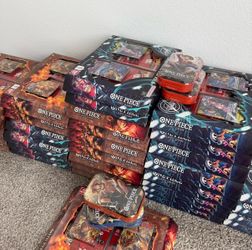 One piece op tcg illustration box and tins