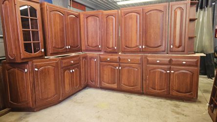 Fieldstone Solid Wood Cherry Kitchen Cabinets with pull outs and glass accent uppers