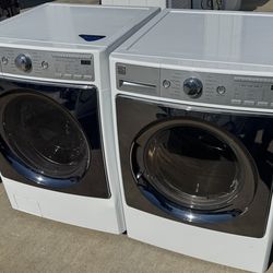 Front load Kenmore elite washer and front load Kenmore elite dryer electric  high efficiency square doors working perfectly extra for delivery same da