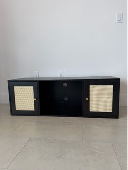 Black TV Stand with Rattan Cane Doors & Gold Knobs
