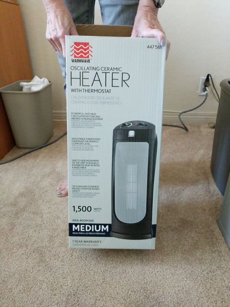 Warmwave Oscillating Ceramic Heater with Thermostat, model HPQ15G-M