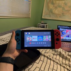 Nintendo Switch Console - Includes Case, Dock, OG Charger and Joycon Grip