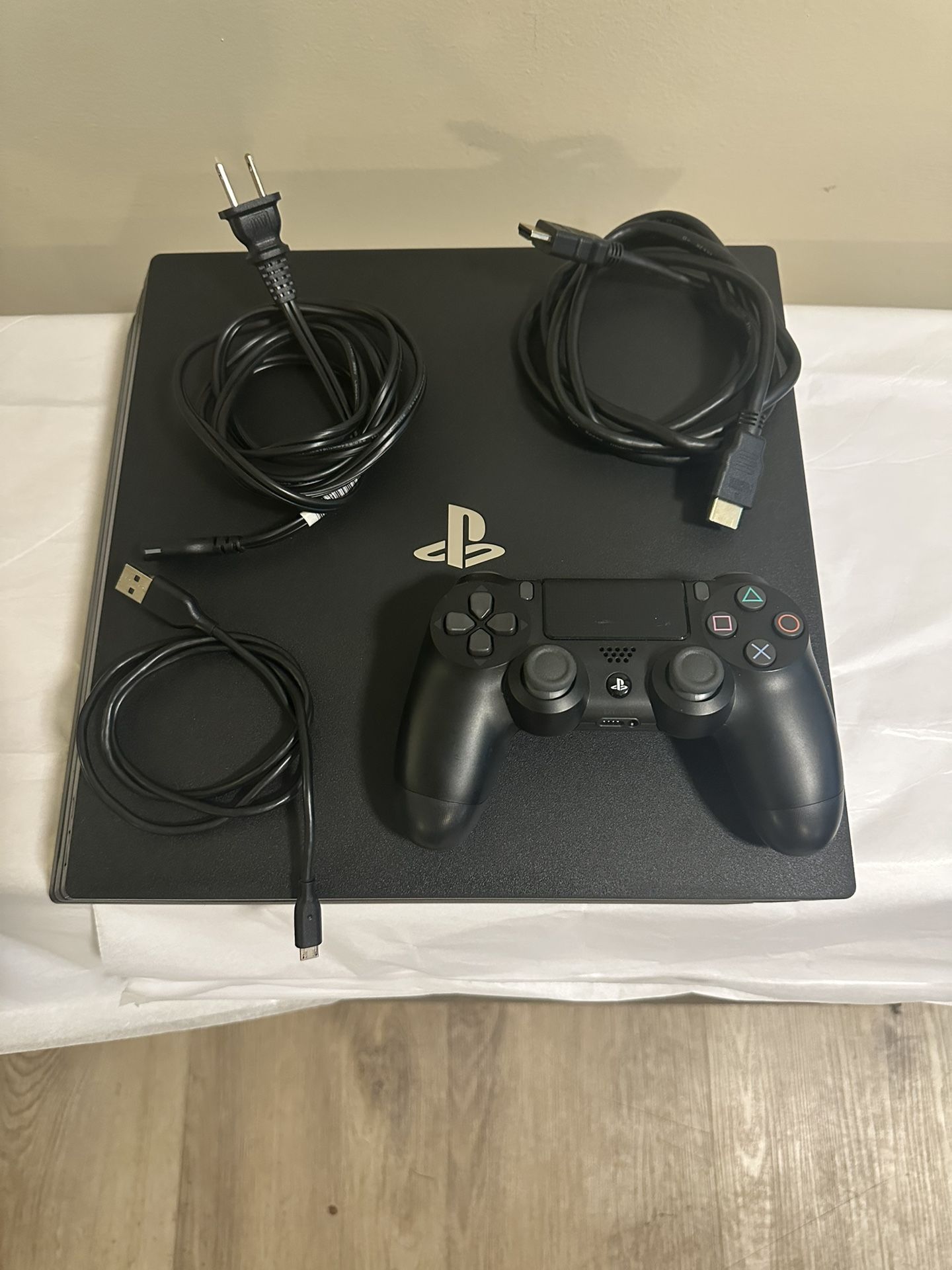 PS4 Pro 1TB Console + Controller