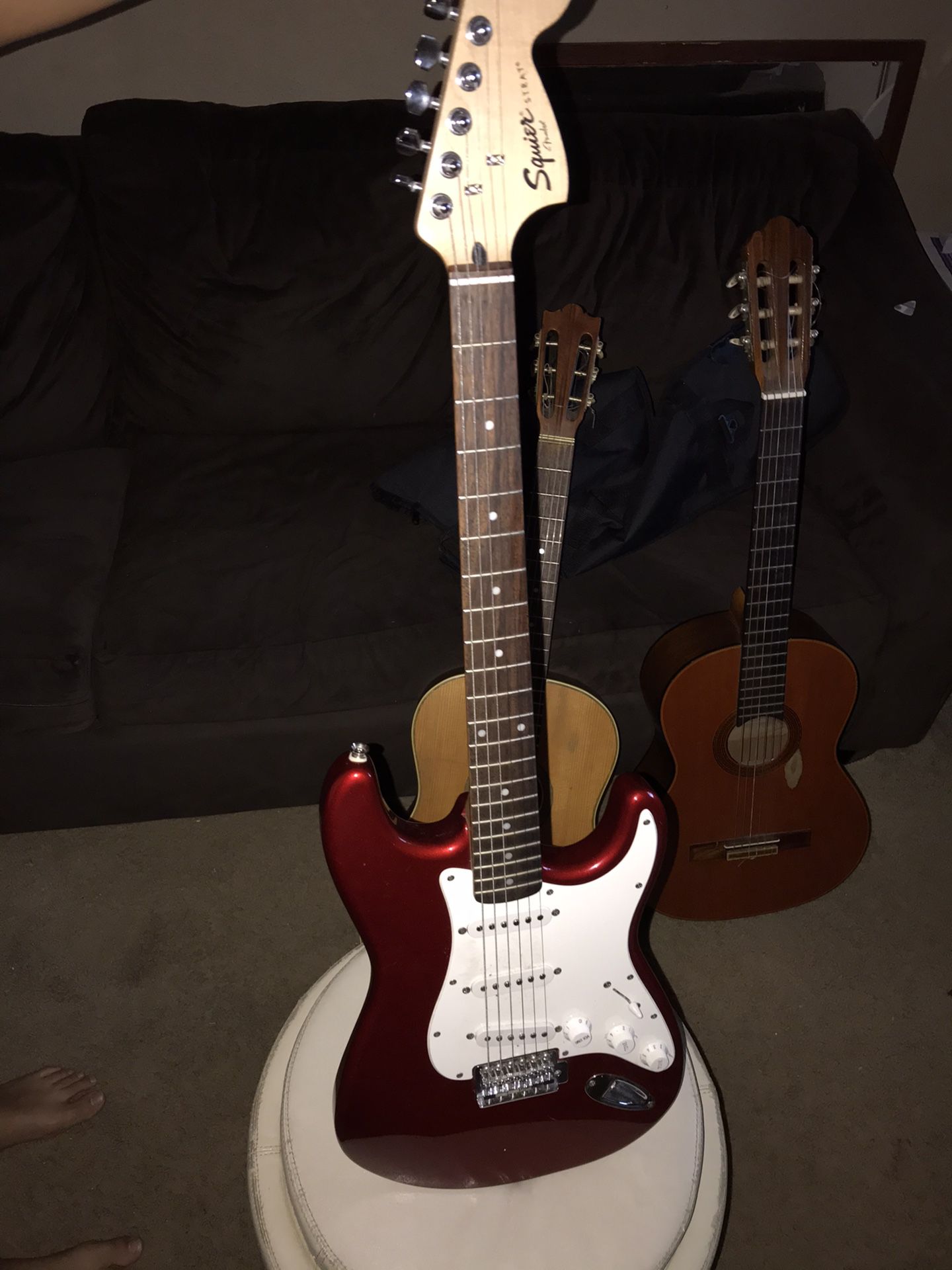 Squier Electric Guitar, Epiphone amp, Fender Guitar bag, and Cord