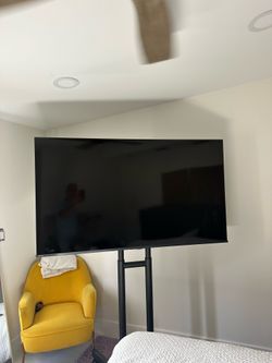Toshiba 65” Smart TV. And stand