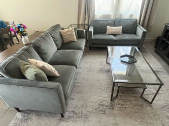 2 couches, 1 coffee table, 1 corner table