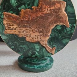 Democratic Republic of the Congo set on a polished malachite base.