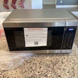 Sharp 1.1 cu. ft. 1000W Stainless Steel Countertop Microwave Brand New