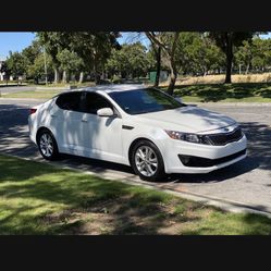 Kia Optima 14 Asking 8,000$ 